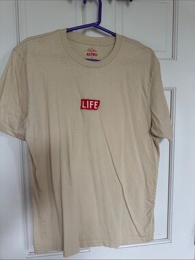 Altru Beige Tee with Red LIFE Chest Logo